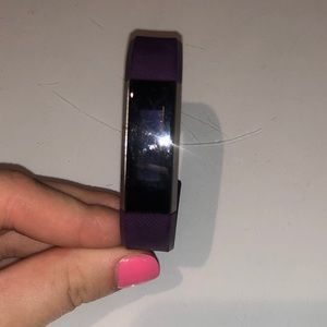 Fitbit (with a purple band)